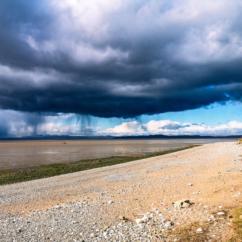 Photograph of distant storm clouds.